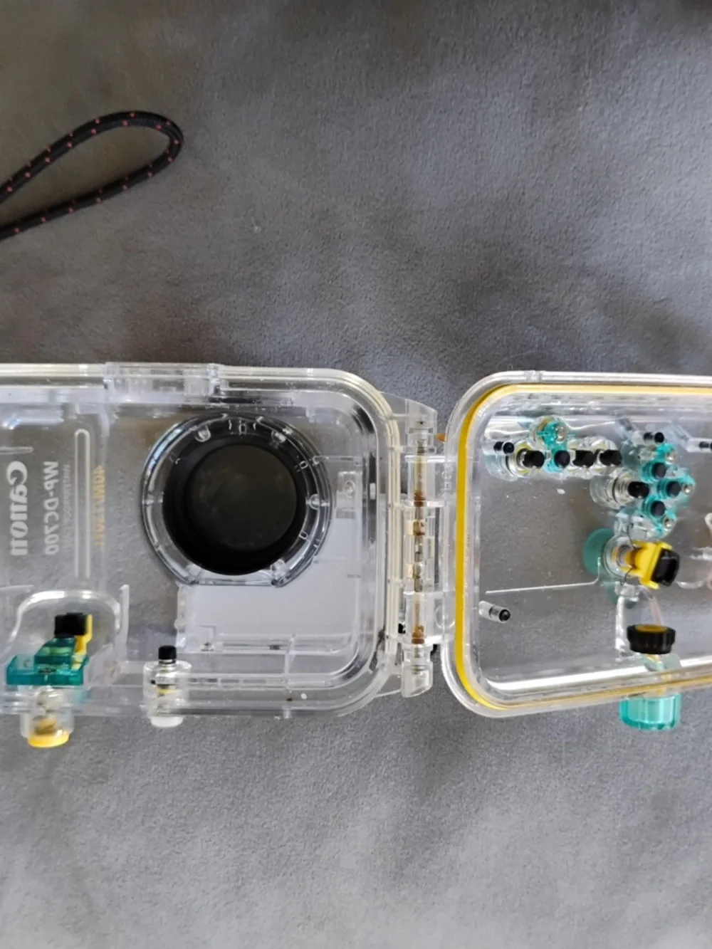 Canon Wp-DC700 Clear Waterproof Camera Housing with Teal and Orange Accents